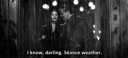 the addams family seance weather GIF