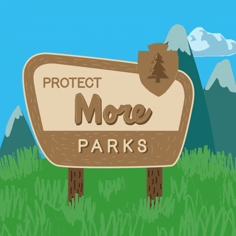 Digital art gif. Illustration of a brown National Parks sign sitting amidst a green meadow in front of snow capped mountains. The sign reads, "Protect more parks."