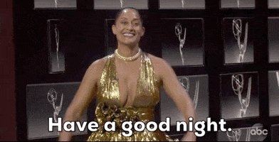 TV gif. Wearing a gold ball gown at the Emmys, Tracee Ellis Ross opens her arms and says, “Have a good night.”