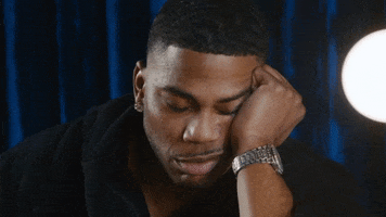 TV gif. Nelly as himself in Real Husbands of Hollywood leaning on his elbow, napping, nods off into deep sleep.