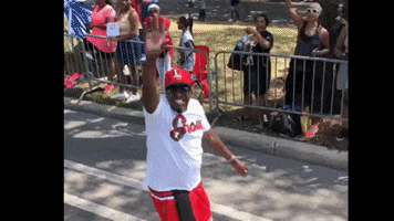 1075WGCI happy excited jumping waving GIF