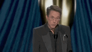 Oscars 2024 gif. Robert Downey Jr wins Best Supporting Actor. He addresses the crowd sincerely and shakes the Oscars trophy for emphasis while he says, "What we do is meaningful and the stuff we decide to make is important."