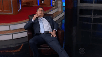 Relaxed Stephen Colbert GIF