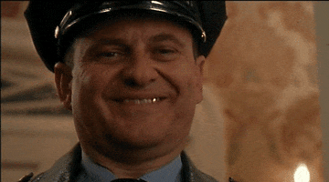 home alone wink GIF