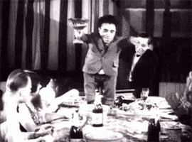 dinner party drinking GIF