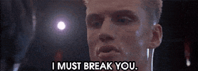 Movie gif. Dolph Lundgren as Ivan Drago in Rocky. He stares Rocky down and says deadpan, "I must break you."