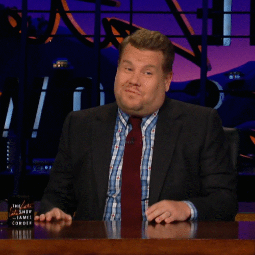 The Late Late Show gif. Host James Cordon of The Late Late Show raises his hands and flops his tongue out of his mouth while laughing. 