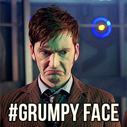 grumpy face gif