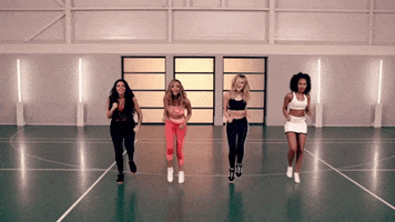 Music video gif. Little Mix members Jesy Nelson, Jade Thirlwall, Perrie Edwards and Leigh-Anne Pinnock jog in place in a gym in the music video, "Word Up!"