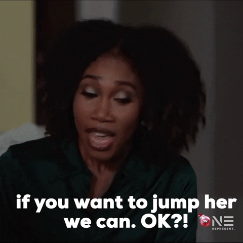 Movie gif. Brittany S. Hall as Monica in Christmas Dilemma cheers on enthusiastically. Text, "if you want to jump her we can. OK?!"