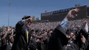 rock on graduation GIF by University of New Hampshire