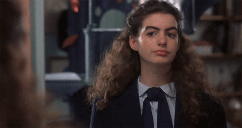 suspicious anne hathaway GIF