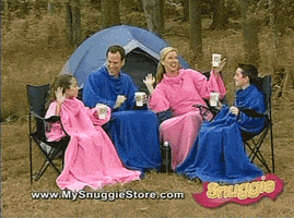 Ad gif. Infomercial with a camping family of four in pink and blue snuggies happily dance in their camp chairs celebrating. 