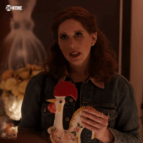 TV gif. Vanessa Bayer as Joanna in I Love That For You. She's holding a rooster statue and looks very serious as she says, "I am really sorry," nodding her head with each word for emphasis.