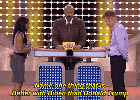 Political gif. Steve Harvey on Family Feud, flanked by two contestants at the face-off podium, reads "Name one thing that is better with Biden than Donald Trump," Amber hits the buzzer and quickly ventures "Literally everything." Harvey turns to the board commanding "Show me literally everything," and the board reveals, in 2nd place, "Everything, 11 points."