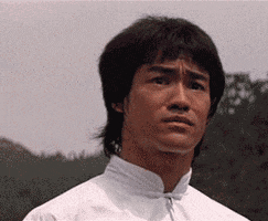 Scared Bruce Lee GIF