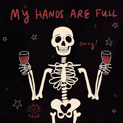 Digital art gif. Cartoon skeleton on a black background with stars shimmies its shoulder and raises its eyebrows while holding glasses of wine in both hands. Text reads, “My hands are full, sorry!"