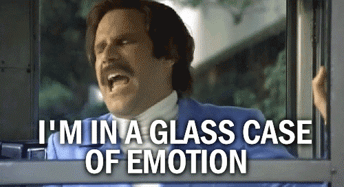 Gif of Will Ferrell in Anchorman standing inside a phone booth yelling "I'm in a glass case of emotion!"