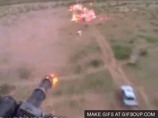 firing minigun GIF