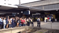 Crowds Cheer as Refugees Arrive in Munich