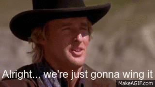 A white man in a cowboy hat smiles in the sun. 