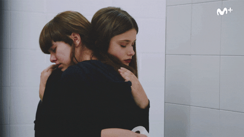 two girls hugging gif