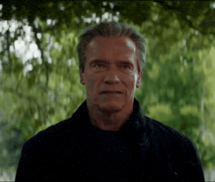 Arnold Schwarzenegger Laughing GIF