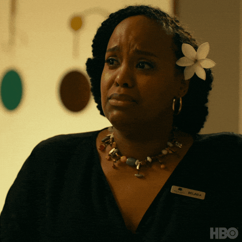 TV gif. Natasha Rothwell as Belinda on The White Lotus cries and shakes her head in pain, looking like she can't take it or believe it.