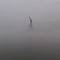 Statue of Liberty Emerges Out of Thick New York City Fog