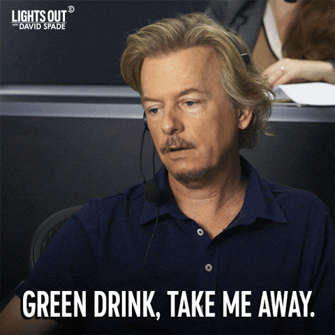 a man in a blue shirt says green drink take me away