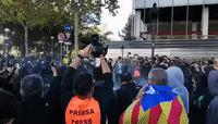Protesters in Barcelona Seek to Head Off Police Demonstration for Equal Pay, Confrontation Ensues