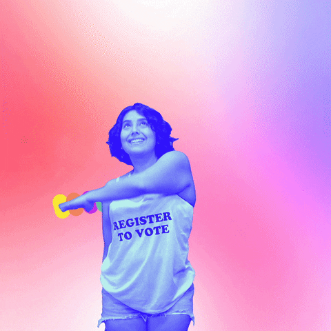 Video gif. Woman wearing a “Register to Vote” tank top over pink and purple background waves an arm over her head in an arch, revealing a sparkling rainbow that reads, “Check your voter registration.”