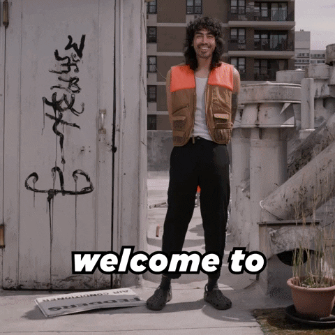 Video gif. A man stands on a city rooftop with his hands behind his back and gets progressively more threatening, bringing out a plastic orange baseball bat and gesturing with his hands like he is owed money. Text, "Welcome to Time to Pay Up. I'm sure you forgot, but I'mma need my $$$$."