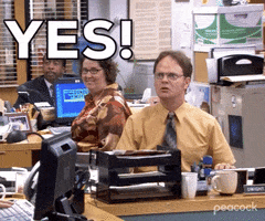 The Office gif. Rainn Wilson as Dwight at his desk, pumping his fist wildly in celebration. Text, "Yes!"