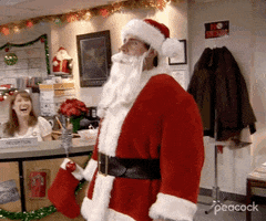 The Office gif. Steve Carell as Michael addresses the office dressed as Santa. Text, "Merry Christmas!"