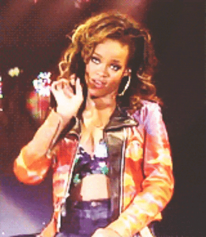 Celebrity gif. Rihanna points at something slowly, but with emphasis. Text, "You better."