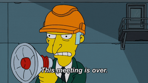 The Simpsons character saying "This meeting is over" into megaphone