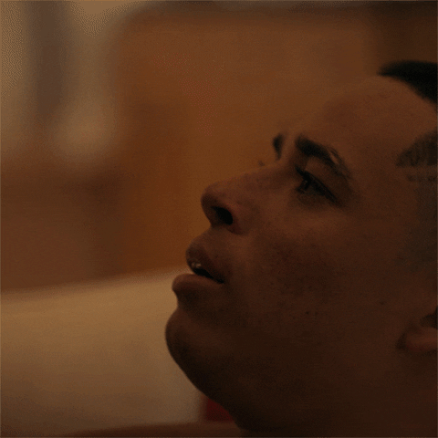 TV gif. Anthony Ramos as Mars on She's Gotta Have It looks at us quizzically, as pink question marks pop up around him.