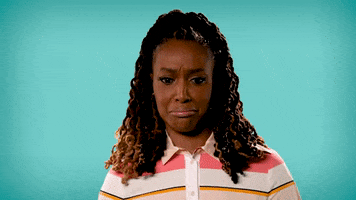 Video gif. Franchesca Ramsey sways with her brow furrowed and her mouth in a taut smile as she says, "Oh, okay."