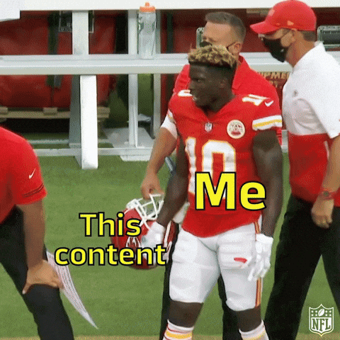 Sports gif. Tyreek Hill of the Kansas chiefs stands on the sidelines drinking a bottle of water. Tyreek is tabled as “Me” and the bottle is tabled “This content.”