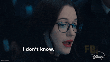 Disney gif. Kat Dennings as Darcy in WandaVision. She's sitting at a table wearing glasses and she says, "I don't know, I don't know, and I don't know," turning closer to the person asking with each phrase. She smiles nicely at the end.