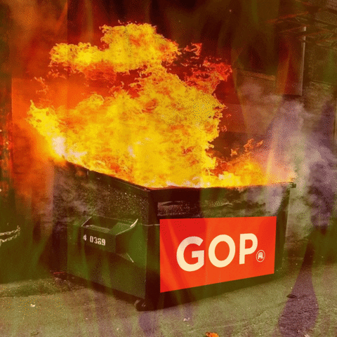 Photo gif. Filter of hazy flames cloaks a fiery dumpster hung with a red sign that reads, "GOP."