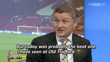 Sports gif. A newscaster on Sky Sports sits in front of a screen of the Old Trafford soccer field where Manchester United plays. He looks excited and says, "But today was probably the beat one I have seen at Old Trafford."
