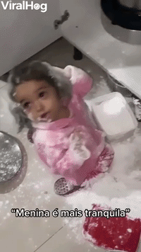 Little Girl Makes a Mess with Flour  