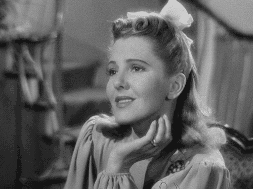 Amused Jean Arthur GIF - Find & Share on GIPHY