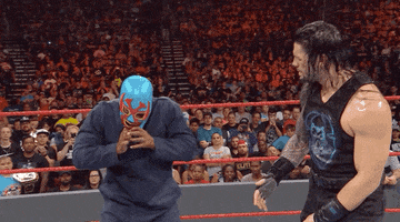unmasking roman reigns GIF by WWE
