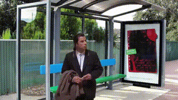 itachi confused travolta bus station GIF