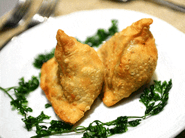 eighty indian food samosa indian cuisine indian snack GIF