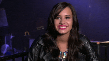 fake smile GIF by Demi Lovato