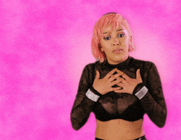 Celebrity gif. Doja Cat holds both of her hands on her chest as she leans forward as if speaking in sincerity. Script, "I'm proud of you."
